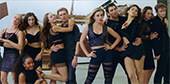 Still image of The FreeDancers work the camera for a photo shoot.